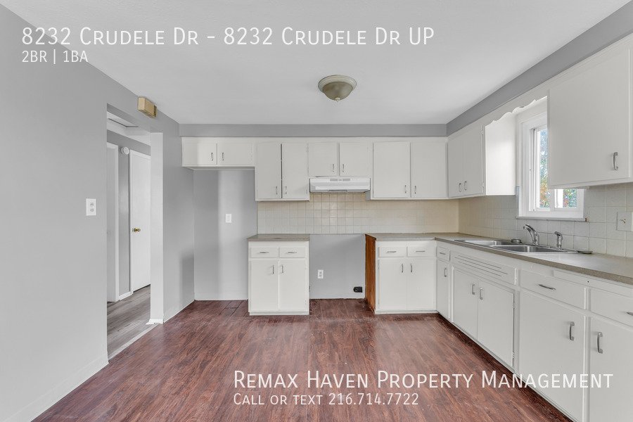 8232 Crudele Dr | UP, Garfield Heights- Spacious 2-bed 1-bath multi-fa property image