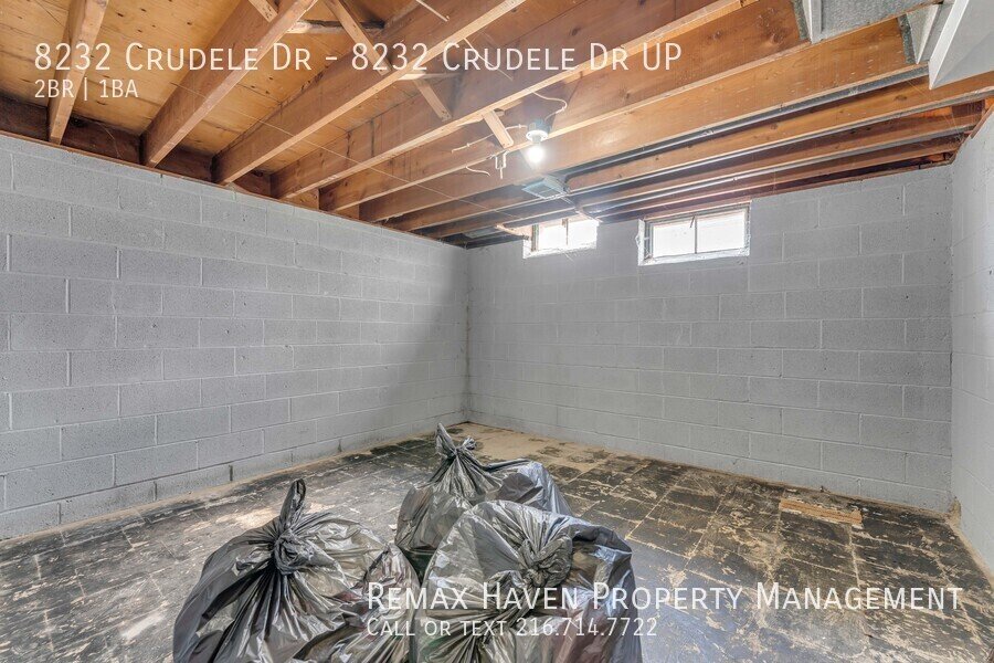 8232 Crudele Dr | UP, Garfield Heights- Spacious 2-bed 1-bath multi-fa property image