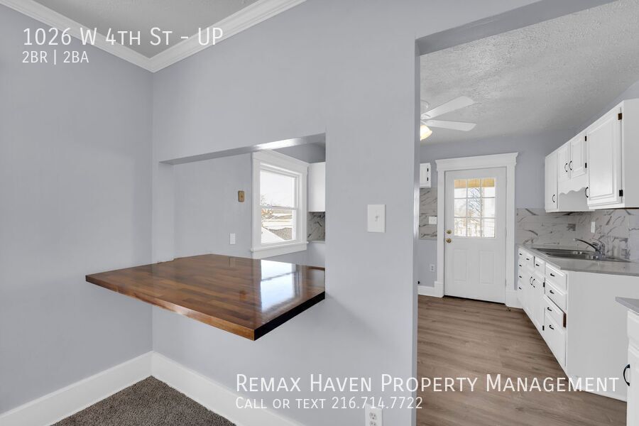 1026 W 4th St | UP, Lorain - Spacious 2-bed 1.5-bath multi-family home!  property image