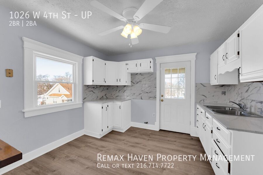 1026 W 4th St | UP, Lorain - Spacious 2-bed 1.5-bath multi-family home!  property image