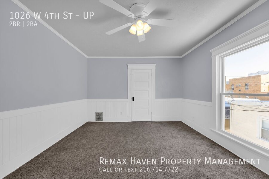 1026 W 4th St | UP, Lorain - Spacious 2-bed 1.5-bath multi-family home!  property image