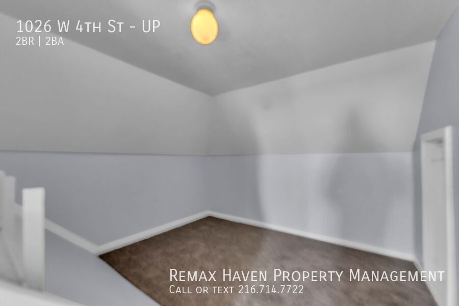 1026 W 4th St | UP, Lorain - Spacious 2-bed 1.5-bath multi-family home!  property image