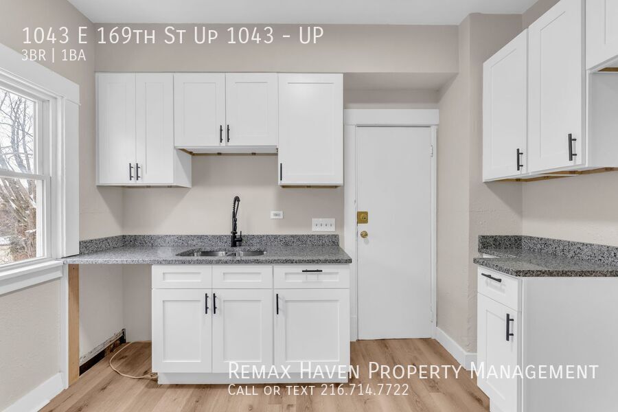 1043 E 169th St | UP, Cleveland - Spacious 3-bed 1-bath multi-family home!  property image