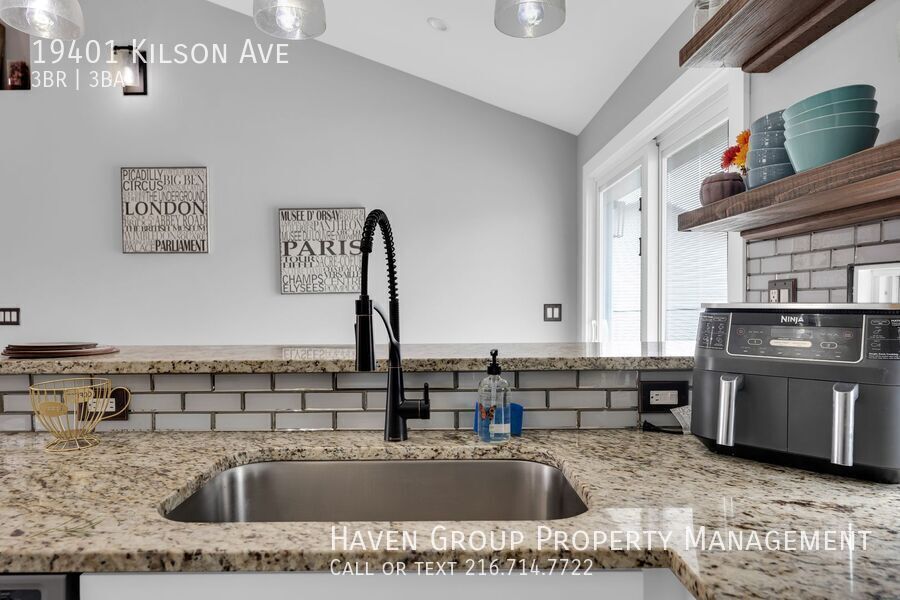 19401 Kilson Ave | Cleveland, OH - Beautifully maintained 3-bed, 3-bath brick ranch offering space, flexibility, and an unbeatable location. property image