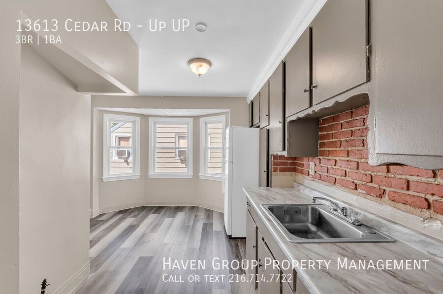 13613 Cedar Rd | UP, University Heights, OH 44118- Spacious 3-bed 1-bath multi-family home! property image