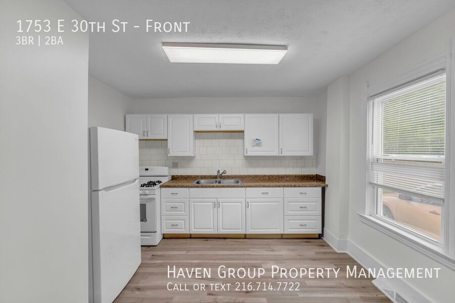 1753 E 30th St | Front, Lorain, OH 44055 - Spacious 3-bed 1.5-bath multi-family home! property image