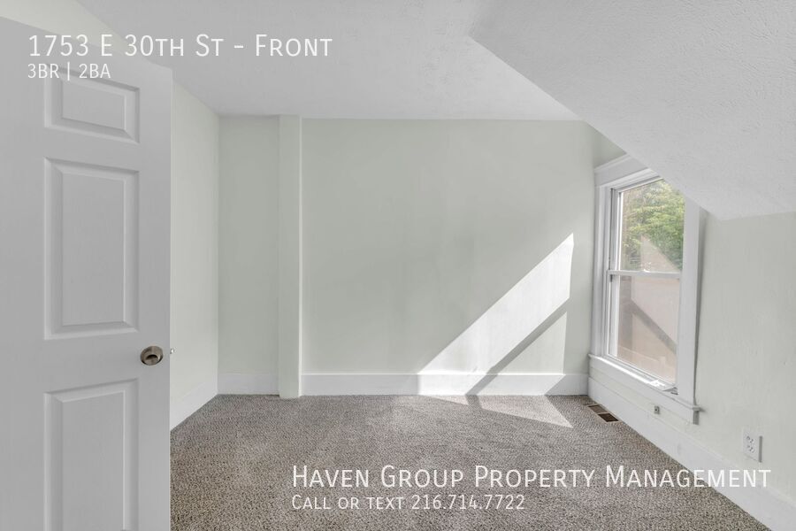 1753 E 30th St | Front, Lorain, OH 44055 - Spacious 3-bed 1.5-bath multi-family home! property image