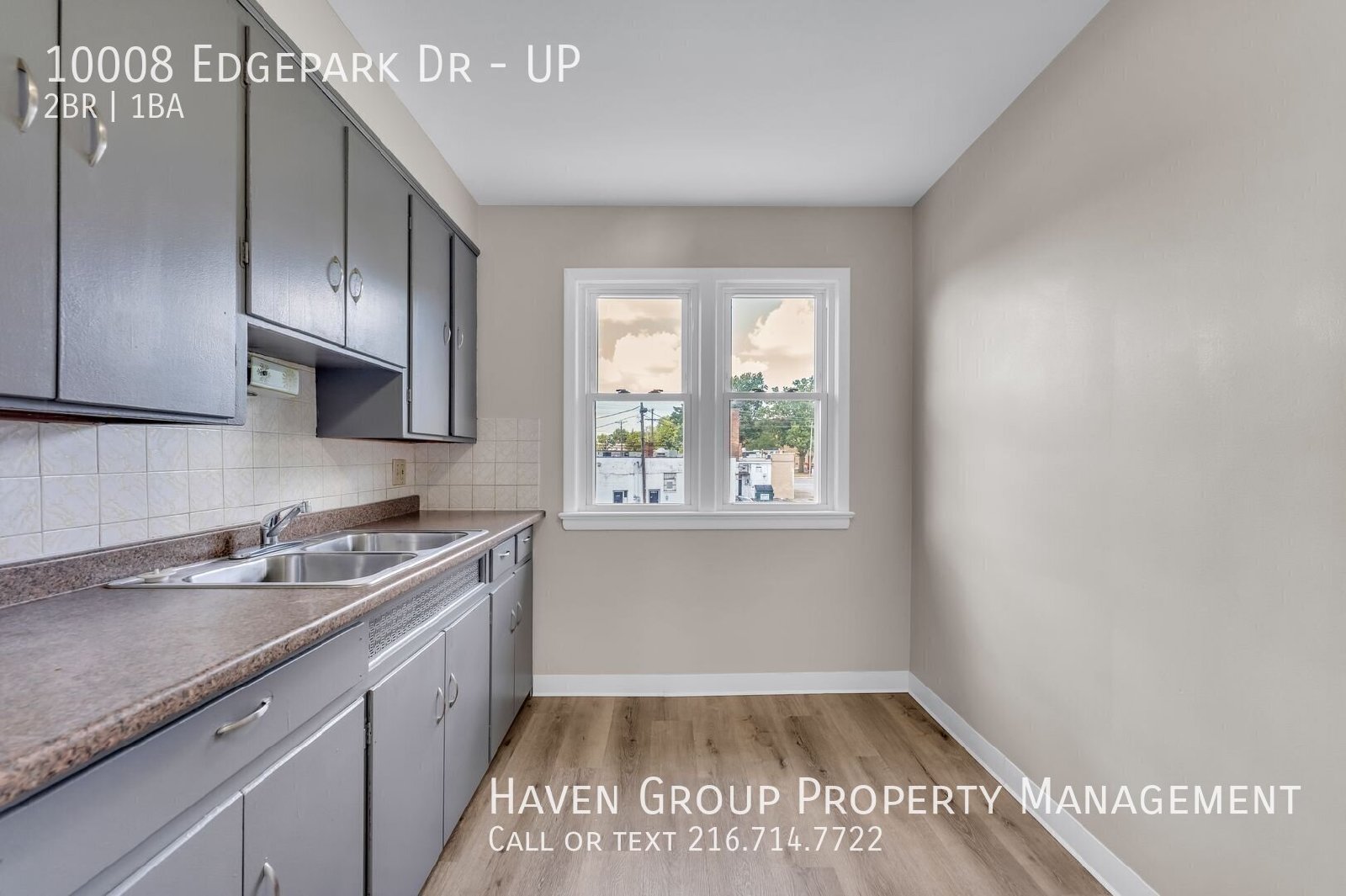 10008 Edgepark Dr | UP, Garfield Heights, OH 44125 - Spacious 2-bed 1-bath multi-family home! property image