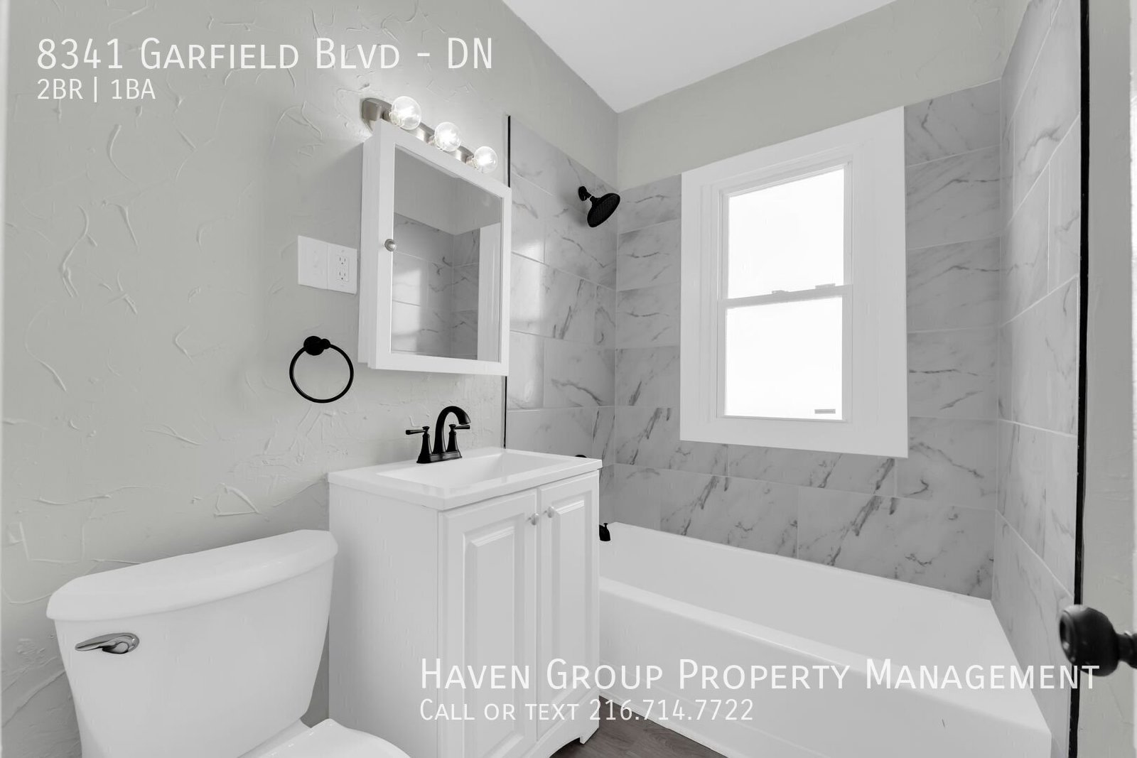 8341 Garfield Blvd | DN, Garfield Heights, OH 44125 - Spacious 2-bed 1-bath multi-family home!   property image